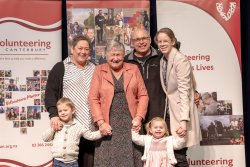 Muriel Hill and company, with her Award