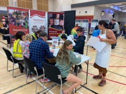 Attendees at the Selwyn CultureFest decorating Bags of Hope for Cancer Society