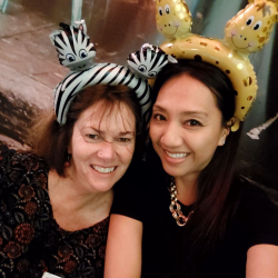Volcan staff member, Glenda, and Volunteering Mid & South Canterbury staff member, Haidee, wearing inflatable headpieces, in the shape of a zebra and a giraffee