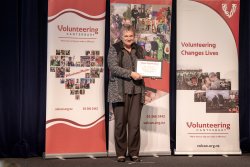 Pam McQuillan, Age Concern Canterbury, with her Award