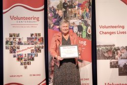 Muriel Hill, Girls Brigade 29th Christchurch Company, with her Award