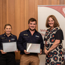 Representatives of the Selwyn Response Team receiving their Awards on stage