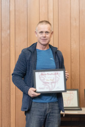 Steve Baker, from Big Brothers Big Sisters North Canterbury, with his award