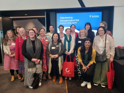 Members of the VCNA at the entrance to the Hui