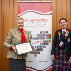 Eleanor Capper, from English Language Partners, receiving her Award