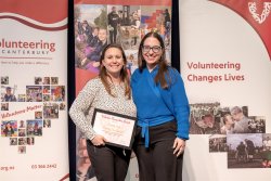 Charlotte Cook and company, with her Award