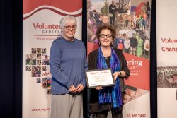 Volunteer Couriers, Clothed in Love, with their Award