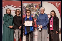 Volunteer Couriers, Clothed in Love, with their Award