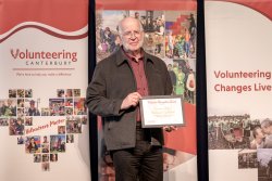 Lawrence Watson, Christchurch City Mission, with his Award