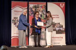 Volunteer Couriers, Clothed in Love, with their Award