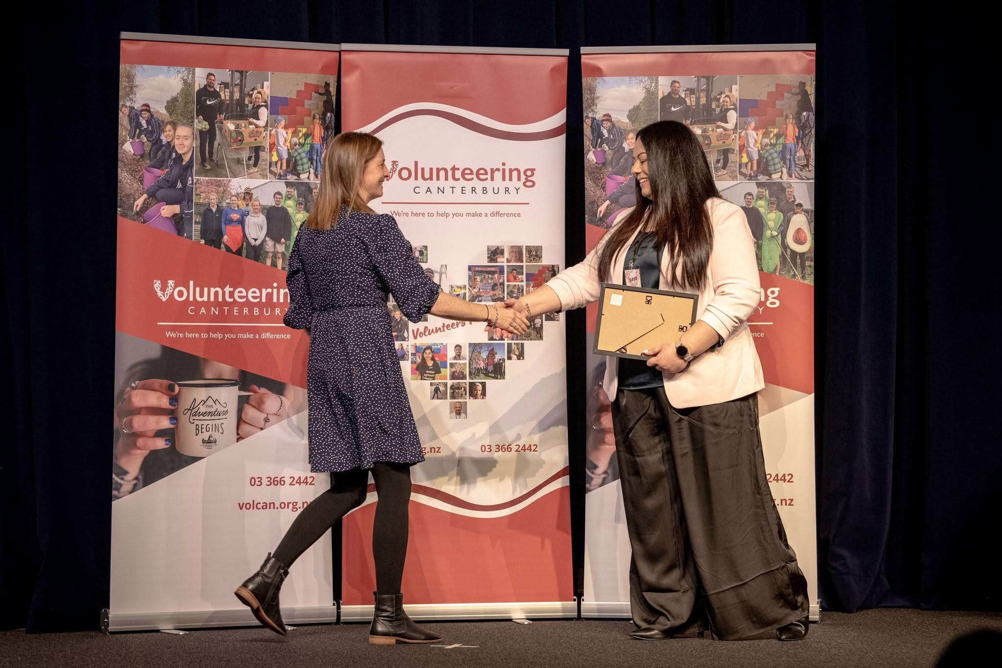 Sorting and Packing Leaders, Clothed in Love, receiving a Volunteer Recognition Award at the 2026 ceremony.
