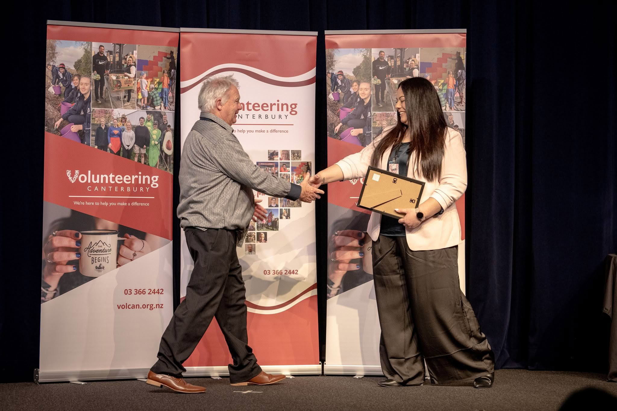Norman Holloway, Compassion Trust Community Care Programs, receiving a Volunteer Recognition Award at the 2026 ceremony.