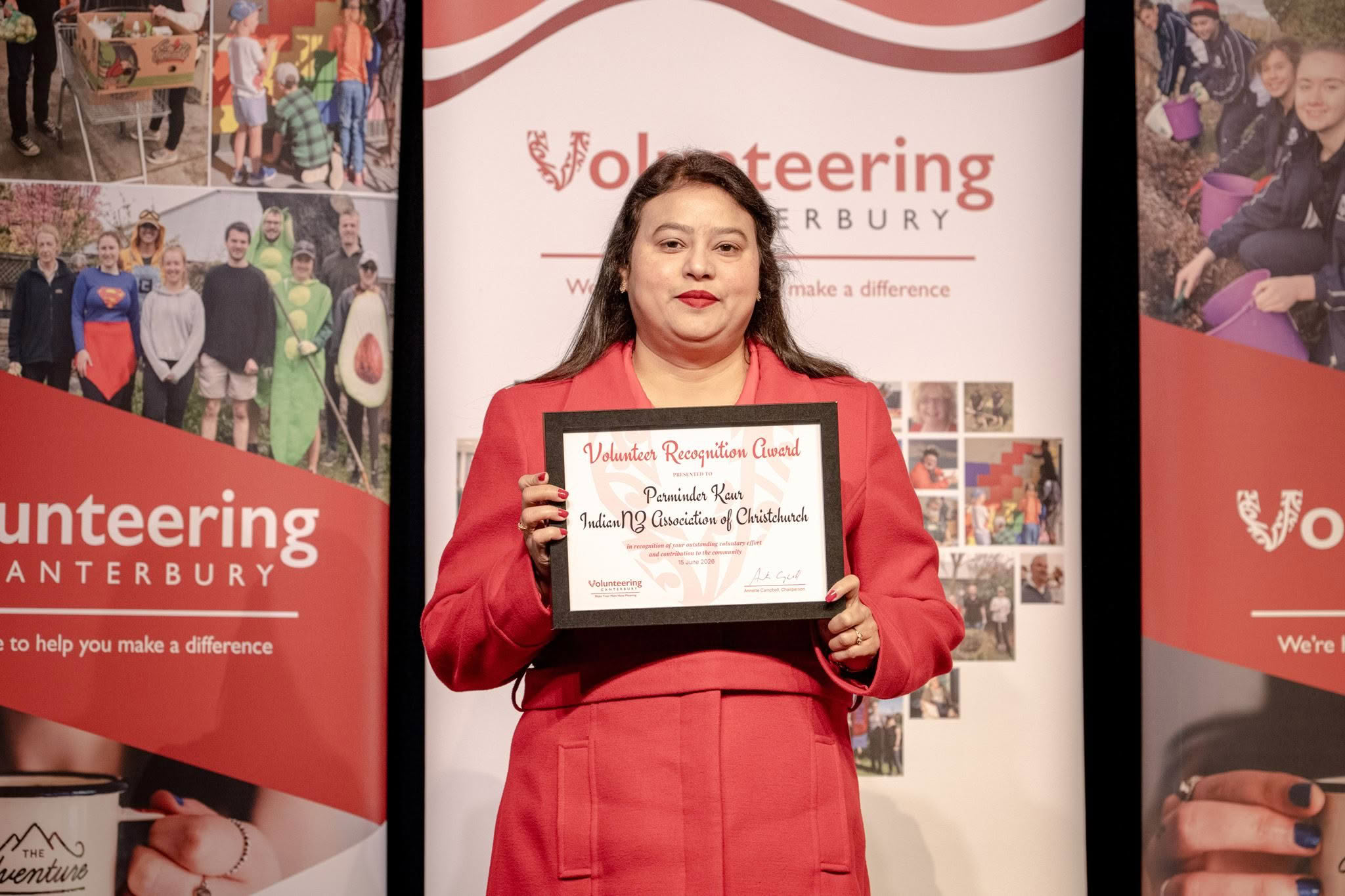 Parminder Kaur, IndianNZ Association of Christchurch, receiving a Volunteer Recognition Award 2026.