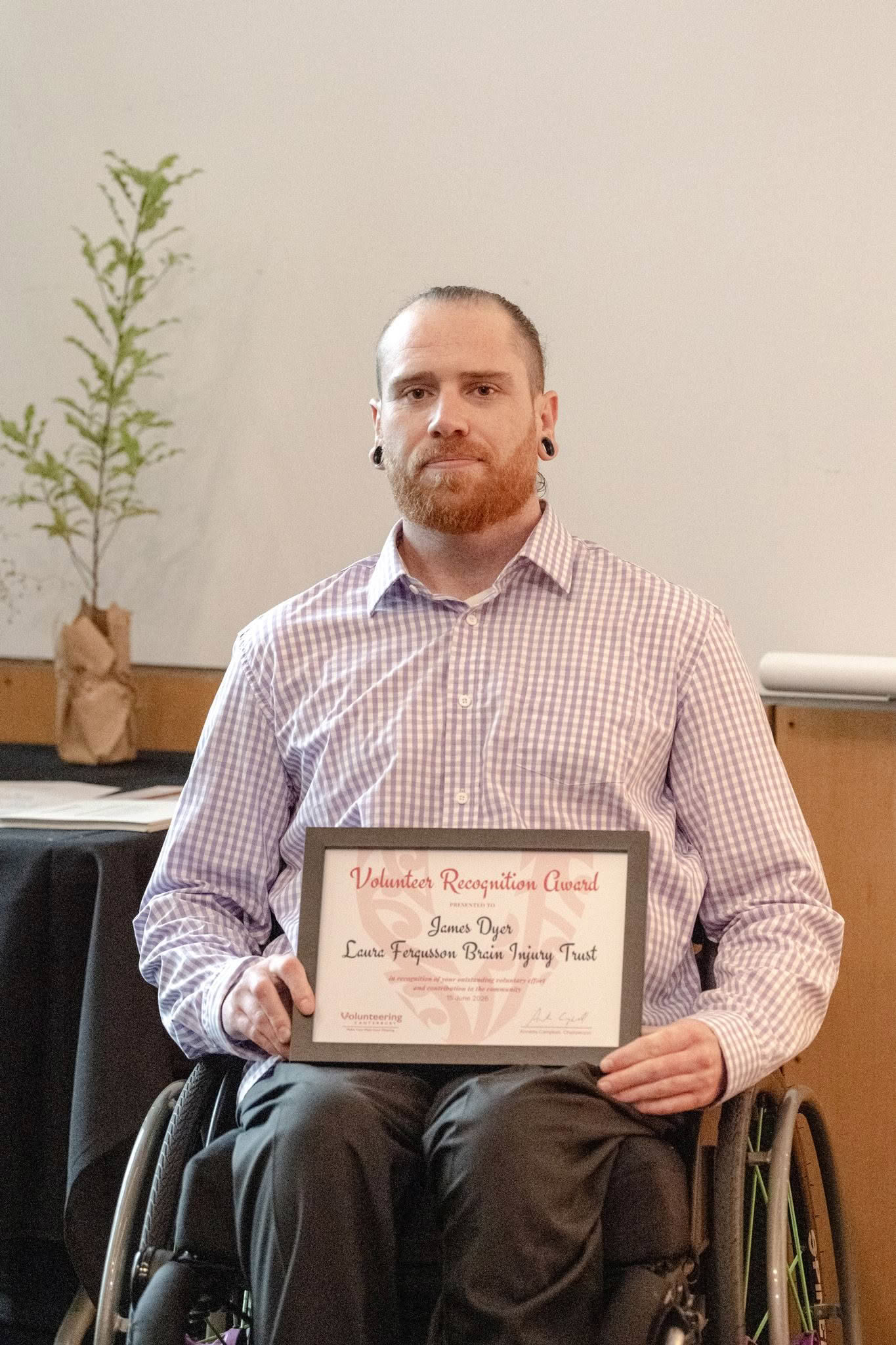 James Dyer, Laura Fergusson Brain Injury Trust, receiving a Volunteer Recognition Award 2026.