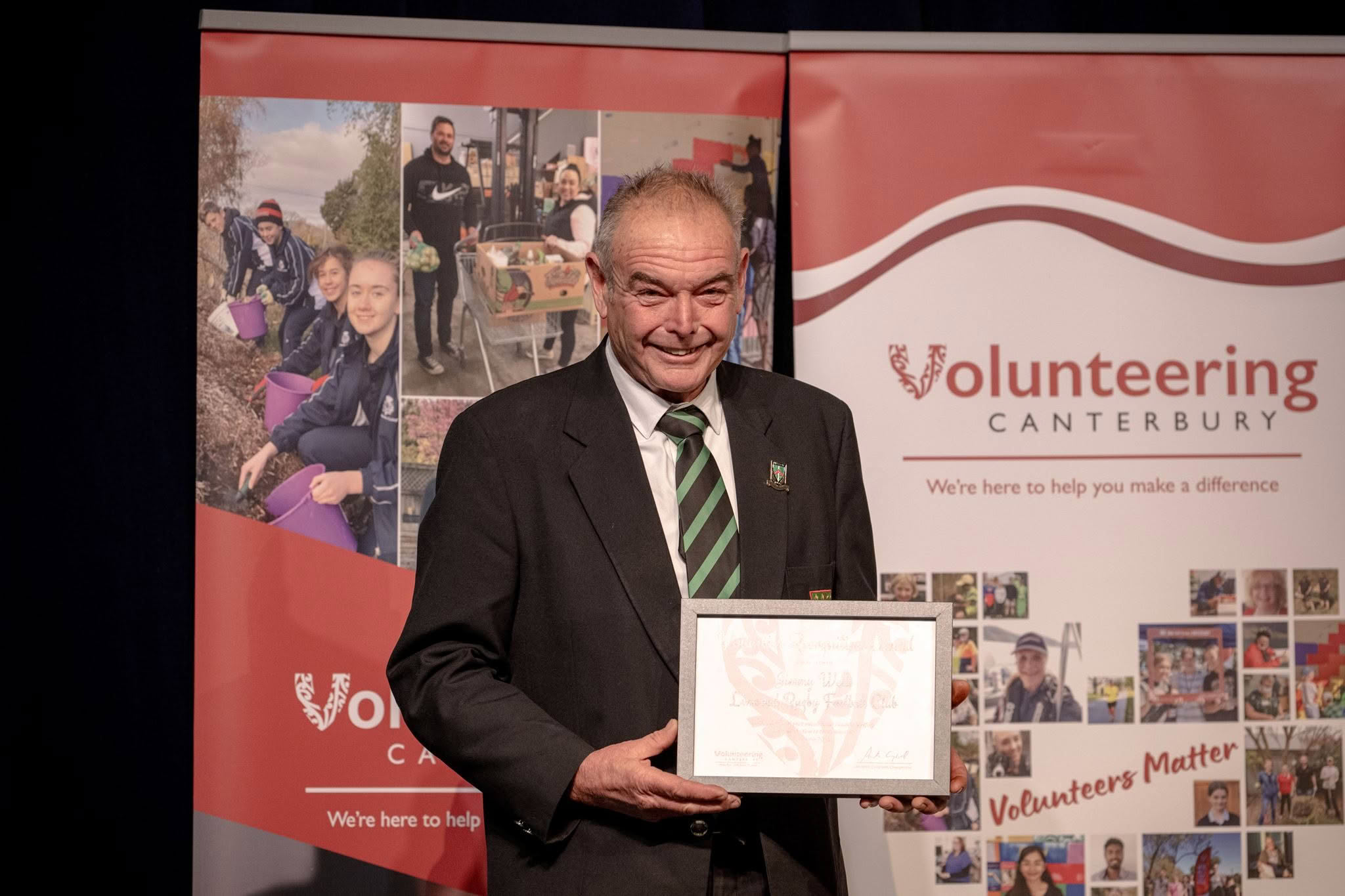 Jimmy Wells, Linwood Rugby Football Club, receiving a Volunteer Recognition Award 2026.