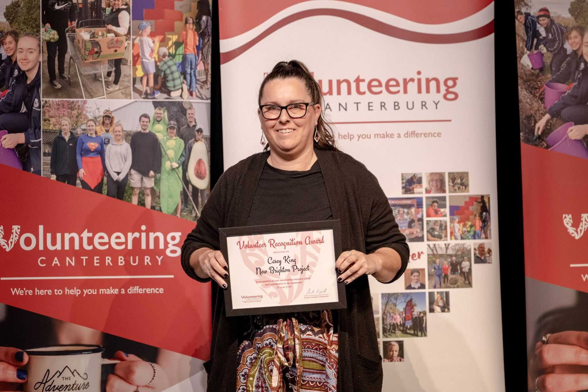 Casey King, New Brighton Project, receiving a Volunteer Recognition Award 2026.